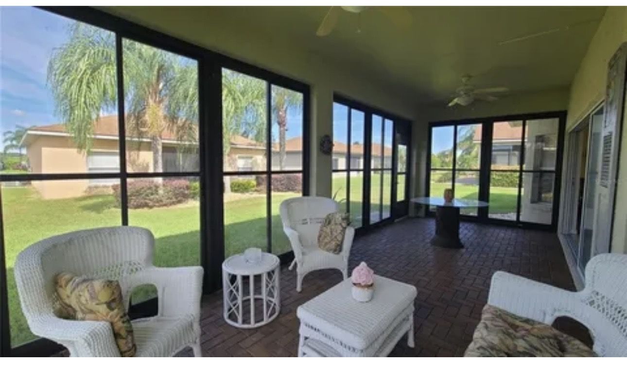 Interior and Exterior Window Cleaning on a Florida Sunroom image